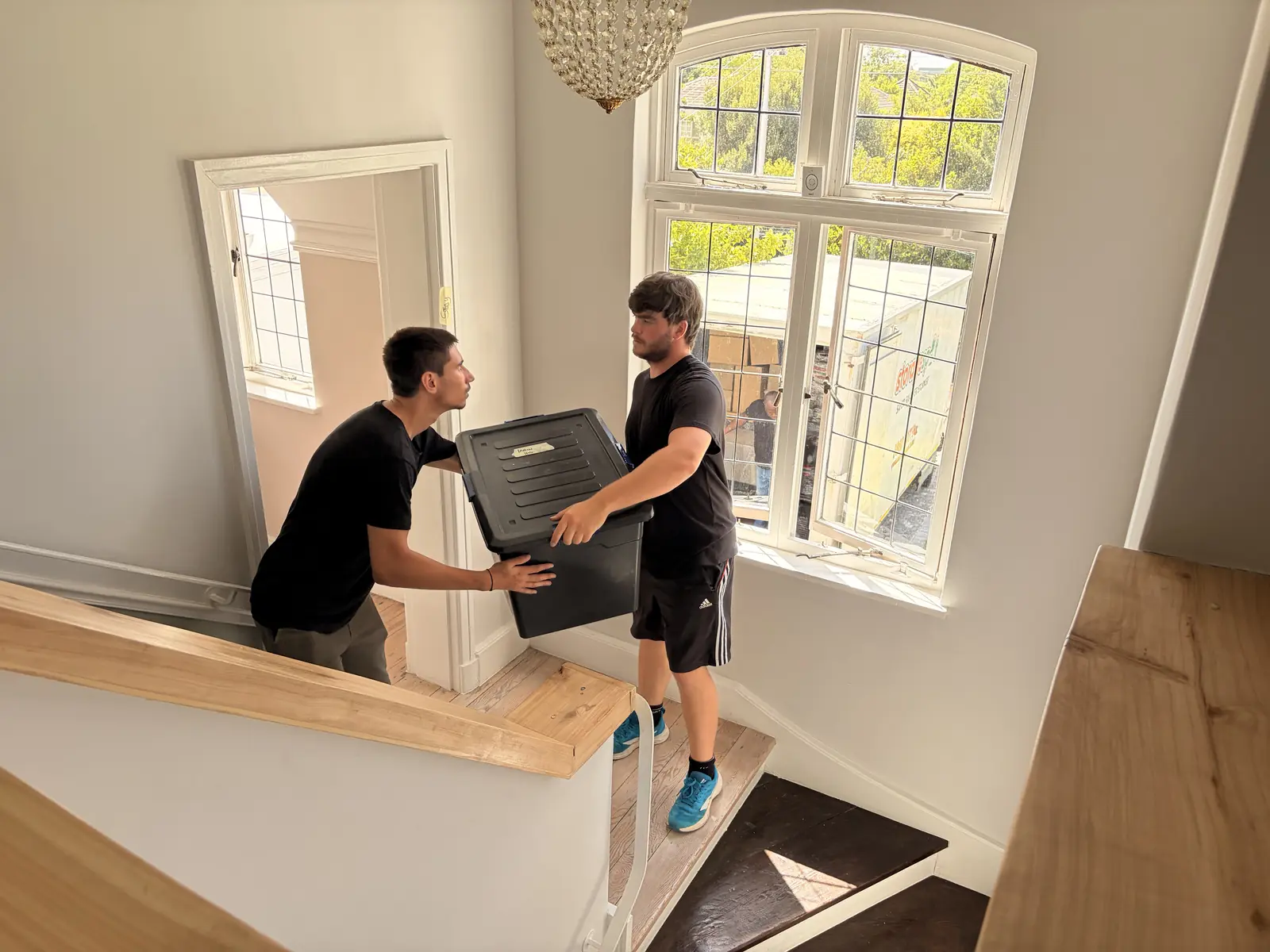 Carefully navigating stairs with heavy items